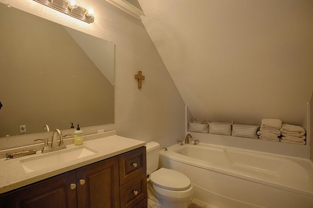 907 Davis Rd, League City, TX 77573 - bathroom with toilet, a garden tub, vanity, and a textured wall