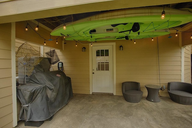907 Davis Rd, League City, TX 77573 - view of exterior entry featuring a patio