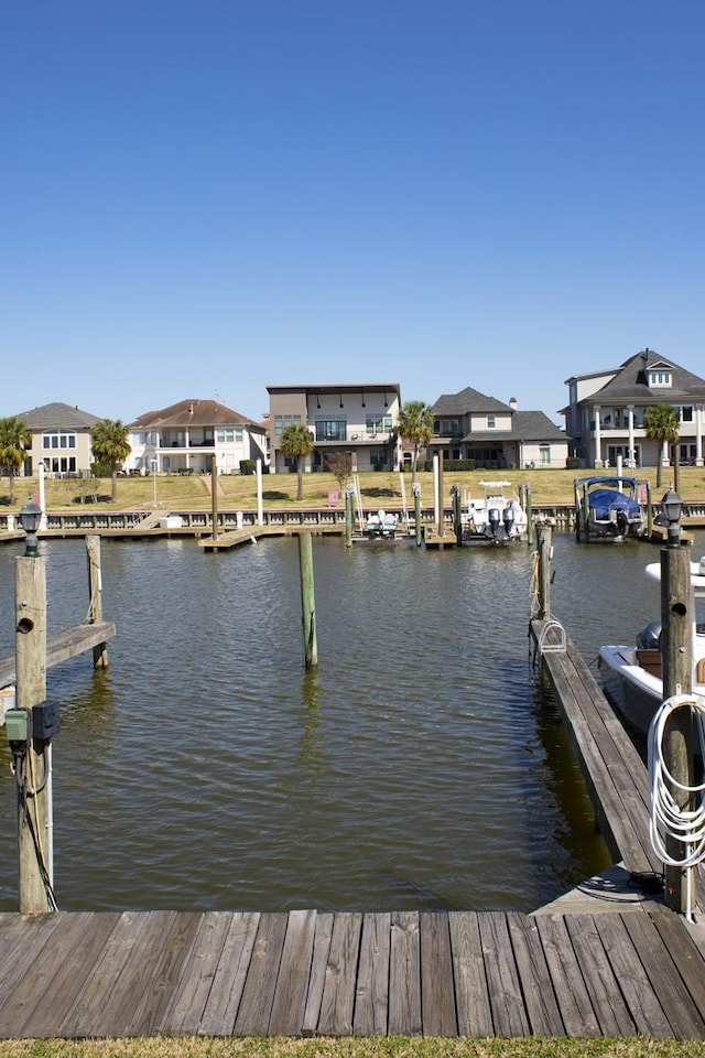907 Davis Rd, League City, TX 77573 - dock with a residential view and a water view