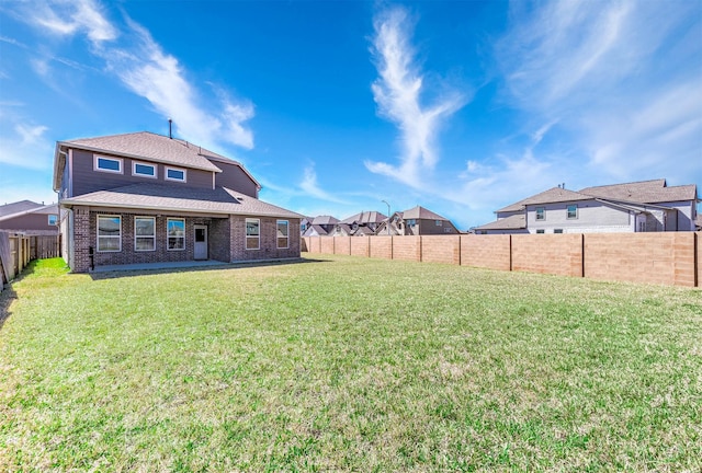 32322 Dusted Bronze Dr, Brookshire, TX 77423 - back of house with brick siding and roof with shingles