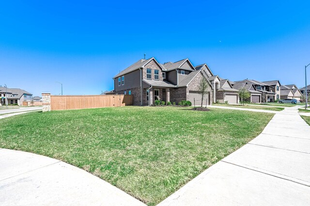 32322 Dusted Bronze Dr, Brookshire, TX 77423 - view of front of house with a residential view and brick siding