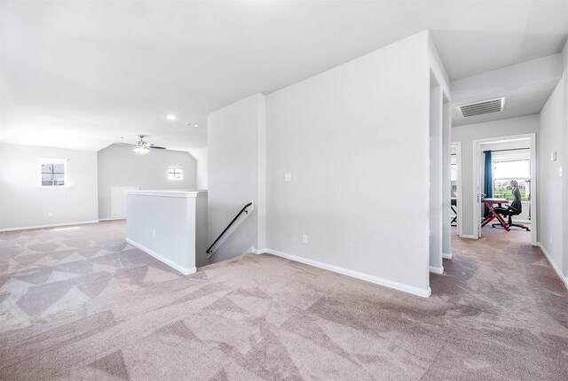 32322 Dusted Bronze Dr, Brookshire, TX 77423 - unfurnished room with light carpet, baseboards, a ceiling fan, lofted ceiling, and recessed lighting