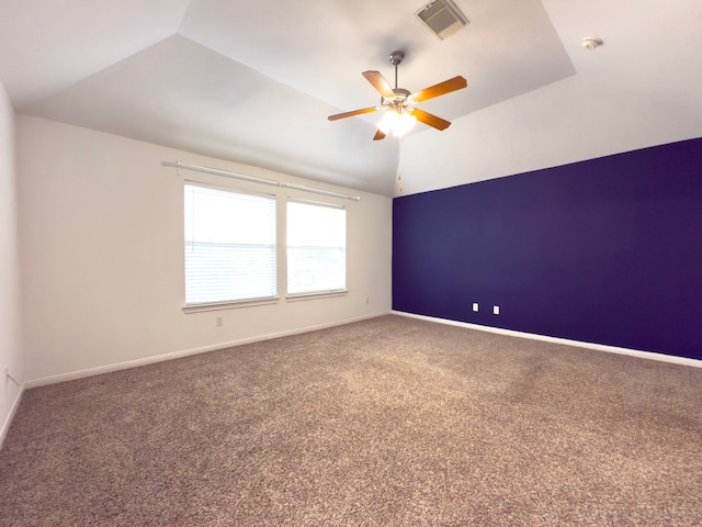 5227 Brinkman Ct, Houston, TX 77091 - empty room featuring vaulted ceiling, ceiling fan, carpet, and baseboards