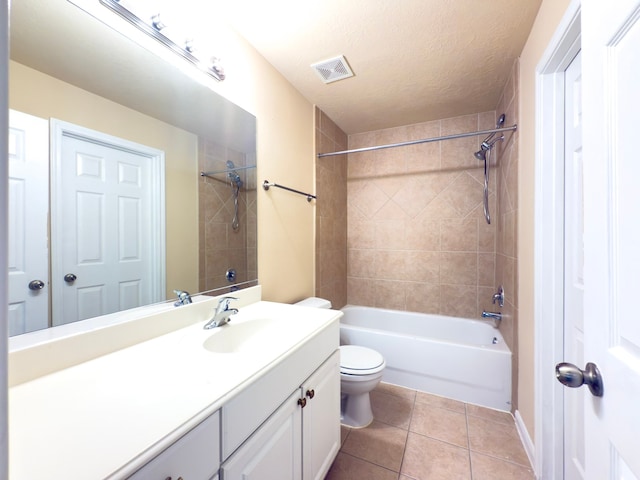 5227 Brinkman Ct, Houston, TX 77091 - full bathroom featuring vanity,  shower combination, toilet, tile patterned floors, and a textured ceiling