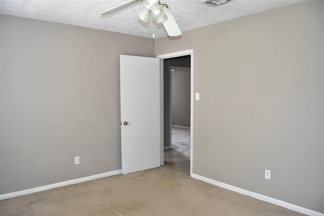 18318 Ella Blvd, Spring, TX 77388 - empty room featuring a ceiling fan, a textured ceiling, carpet floors, and baseboards