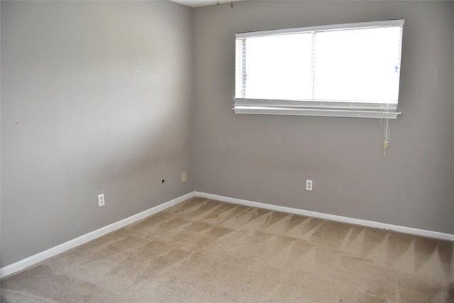 18318 Ella Blvd, Spring, TX 77388 - empty room featuring light carpet and baseboards