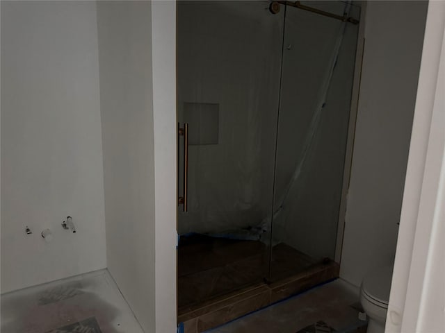5115 S Braeswood Blvd, Houston, TX 77096 - full bathroom featuring toilet and a stall shower