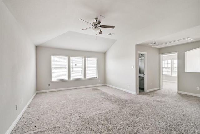 350 Selah Ct, Alvin, TX 77511 - unfurnished room with light colored carpet, lofted ceiling, attic access, and ceiling fan