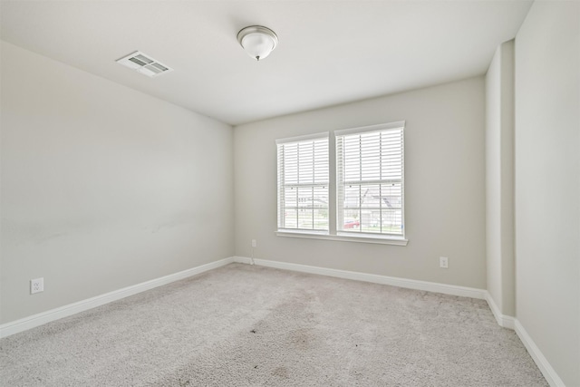 350 Selah Ct, Alvin, TX 77511 - empty room with light colored carpet and baseboards