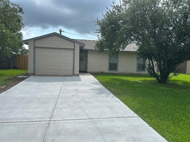 6322 Purple Sage Rd, Houston, TX 77049 - ranch-style home with concrete driveway, a garage, and brick siding