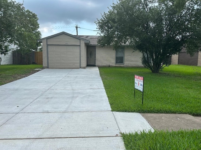 6322 Purple Sage Rd, Houston, TX 77049 - ranch-style home featuring an attached garage, concrete driveway, and brick siding