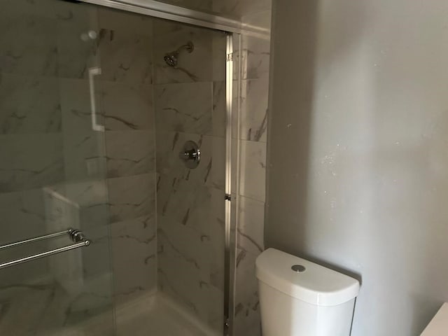 6322 Purple Sage Rd, Houston, TX 77049 - full bathroom featuring a shower stall and toilet