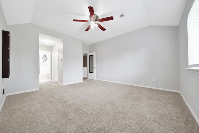 1726 Havelock Dr, Spring, TX 77386 - unfurnished room featuring vaulted ceiling, a ceiling fan, light carpet, and baseboards