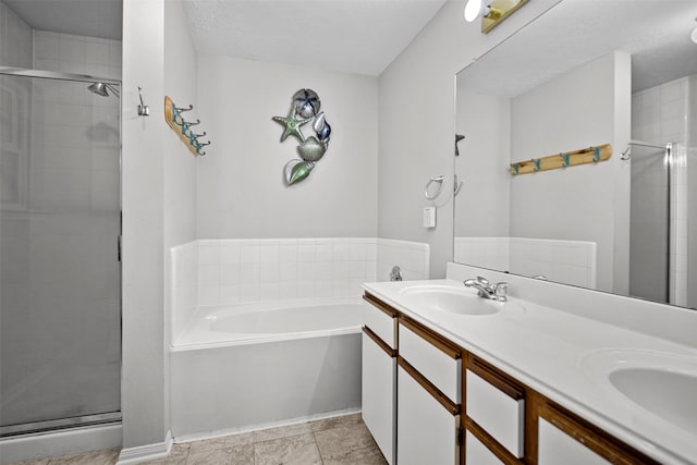 1726 Havelock Dr, Spring, TX 77386 - bathroom featuring a shower stall, a garden tub, and double vanity