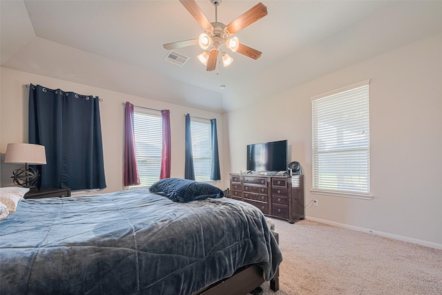 4507 Shallow Hill Ct, Houston, TX 77084 - bedroom with multiple windows, light colored carpet, baseboards, lofted ceiling, and a ceiling fan