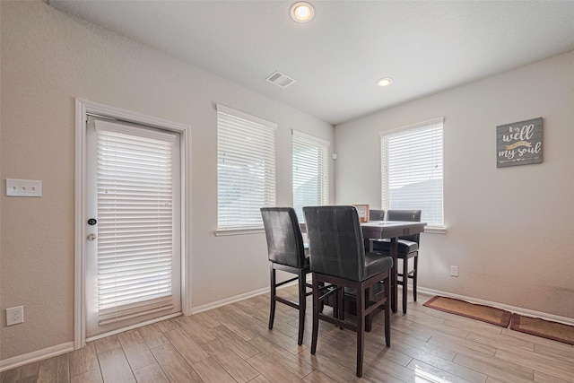 4507 Shallow Hill Ct, Houston, TX 77084 - dining area with light wood-style floors and baseboards