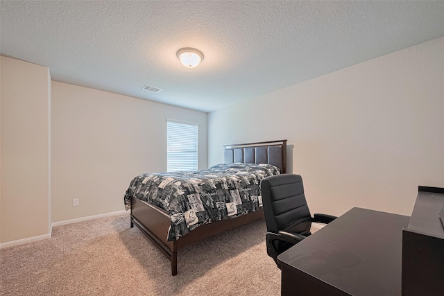 4507 Shallow Hill Ct, Houston, TX 77084 - carpeted bedroom with a desk, a textured ceiling, and baseboards