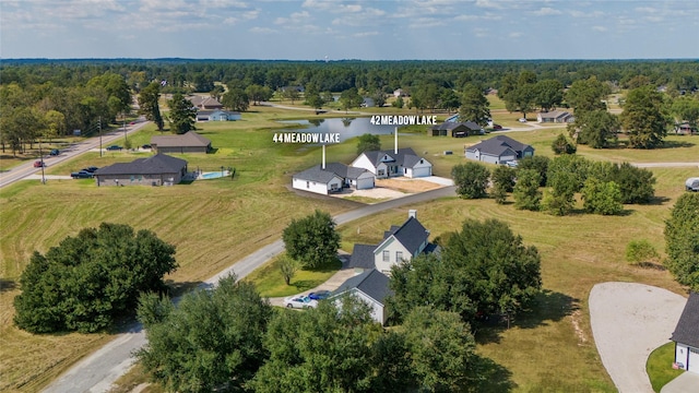 42 Meadow Lake Dr, Trinity, TX 75862 - aerial perspective of suburban area with a large body of water