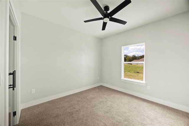 42 Meadow Lake Dr, Trinity, TX 75862 - carpeted empty room featuring baseboards and a ceiling fan