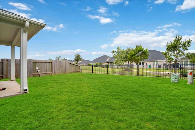 5215 Sunway Dr, Katy, TX 77493 - view of yard featuring a patio area and a residential view