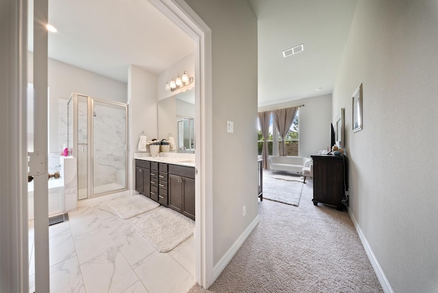 29023 Laurel Grove Ln, Fulshear, TX 77441 - full bath featuring a marble finish shower, vanity, baseboards, marble look tile flooring, and a tub to relax in