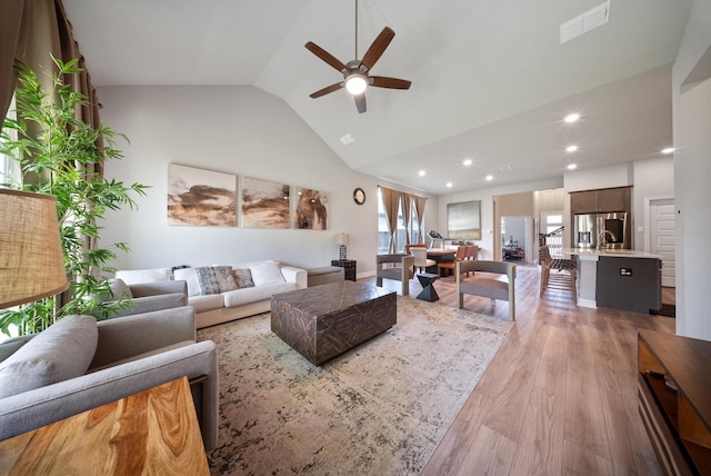 29023 Laurel Grove Ln, Fulshear, TX 77441 - living room featuring a ceiling fan, light wood finished floors, recessed lighting, and high vaulted ceiling