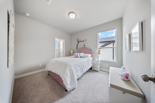 29023 Laurel Grove Ln, Fulshear, TX 77441 - carpeted bedroom with multiple windows and baseboards
