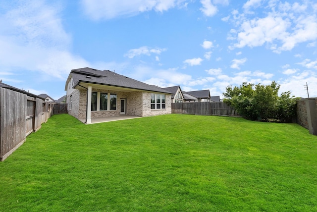 29023 Laurel Grove Ln, Fulshear, TX 77441 - rear view of property featuring a patio and brick siding