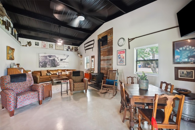 6448 Fm 2nd Rd, Navasota, TX 77868 - dining area featuring a wood stove and concrete flooring