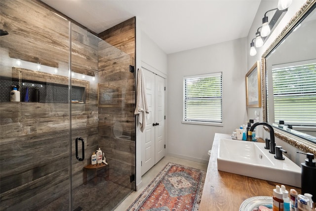 6448 Fm 2nd Rd, Navasota, TX 77868 - bathroom featuring vanity, a stall shower, and baseboards