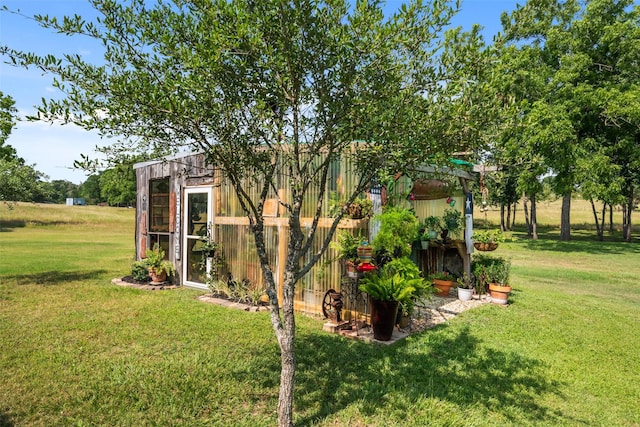 6448 Fm 2nd Rd, Navasota, TX 77868 - view of grassy yard featuring an outdoor structure