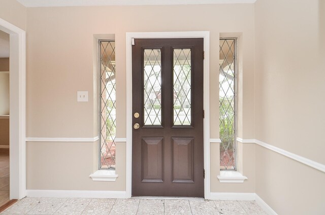 11703 Easterling Dr, Houston, TX 77065 - foyer featuring baseboards