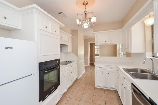 11703 Easterling Dr, Houston, TX 77065 - kitchen featuring black appliances, a sink, light tile patterned flooring, and white cabinetry