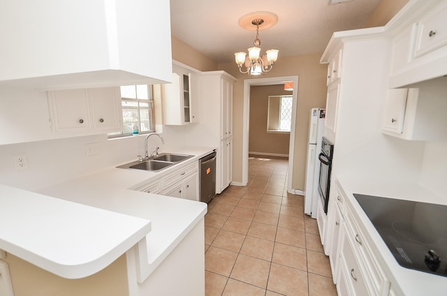 11703 Easterling Dr, Houston, TX 77065 - kitchen with a sink, black electric stovetop, dishwasher, light tile patterned flooring, and light countertops
