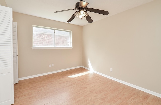 11703 Easterling Dr, Houston, TX 77065 - unfurnished bedroom featuring light wood finished floors, baseboards, and ceiling fan