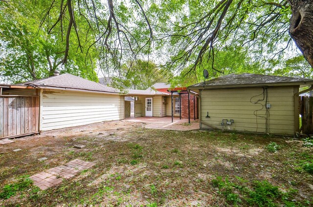 11703 Easterling Dr, Houston, TX 77065 - rear view of property featuring a patio area