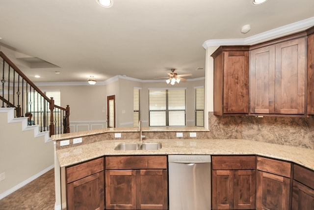 5627 Darling, Houston, TX 77007 - kitchen with stainless steel dishwasher, a sink, a peninsula, ceiling fan, and light stone countertops