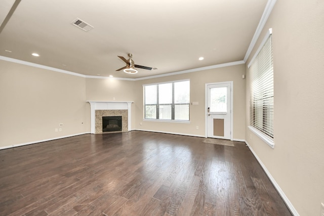 5627 Darling, Houston, TX 77007 - unfurnished living room featuring ceiling fan, dark wood-style flooring, crown molding, a fireplace, and baseboards