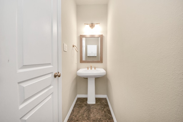 5627 Darling, Houston, TX 77007 - bathroom with baseboards and tile patterned flooring