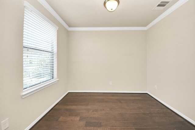 5627 Darling, Houston, TX 77007 - empty room featuring wood finished floors, crown molding, and baseboards