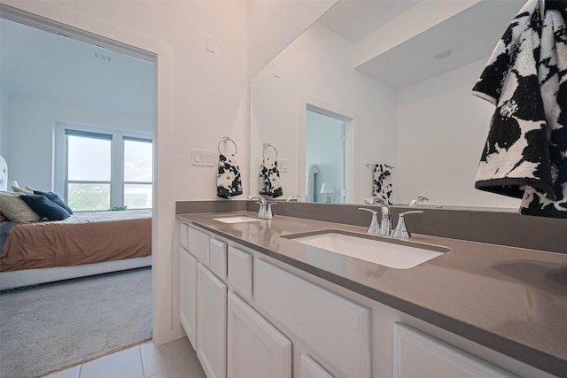 11251 Buchanan Coves Ln, Cypress, TX 77433 - ensuite bathroom with tile patterned flooring and double vanity
