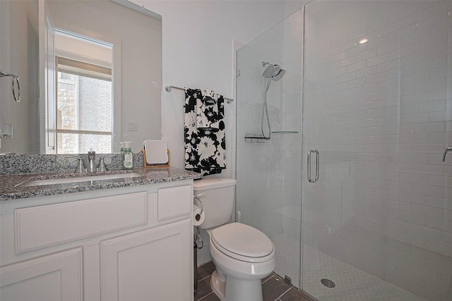 11251 Buchanan Coves Ln, Cypress, TX 77433 - bathroom with a stall shower, vanity, and toilet