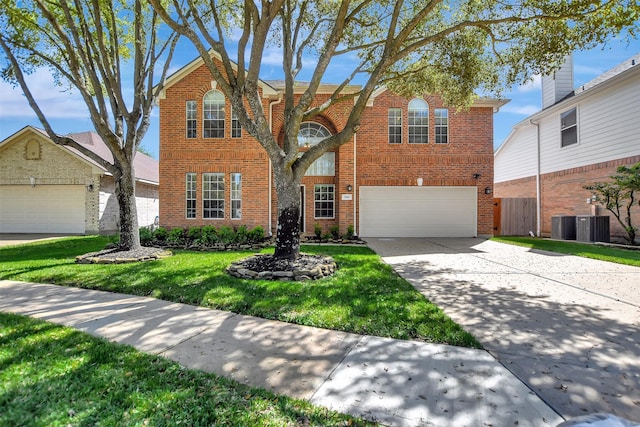 7818 Desert Canyon Ct, Houston, TX 77041 - traditional-style house with brick siding, driveway, an attached garage, and cooling unit
