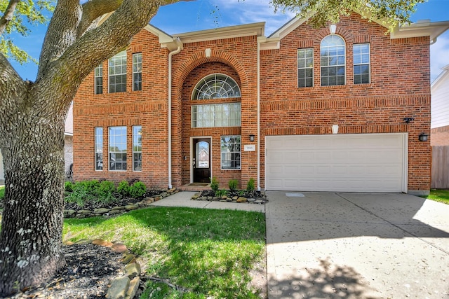 7818 Desert Canyon Ct, Houston, TX 77041 - traditional-style house with brick siding, driveway, a garage, and a front yard