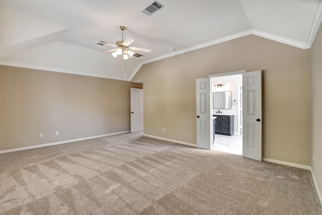 7818 Desert Canyon Ct, Houston, TX 77041 - unfurnished bedroom with lofted ceiling, crown molding, light carpet, baseboards, and ensuite bathroom