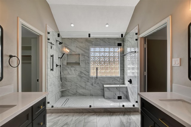 7818 Desert Canyon Ct, Houston, TX 77041 - bathroom with two vanities, vaulted ceiling, a shower stall, marble finish flooring, and recessed lighting
