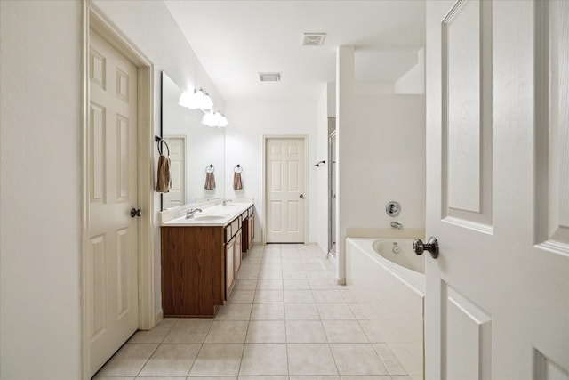 18411 S Raven Shore Dr, Cypress, TX 77433 - bathroom with double vanity, tile patterned floors, a bath, and a shower stall