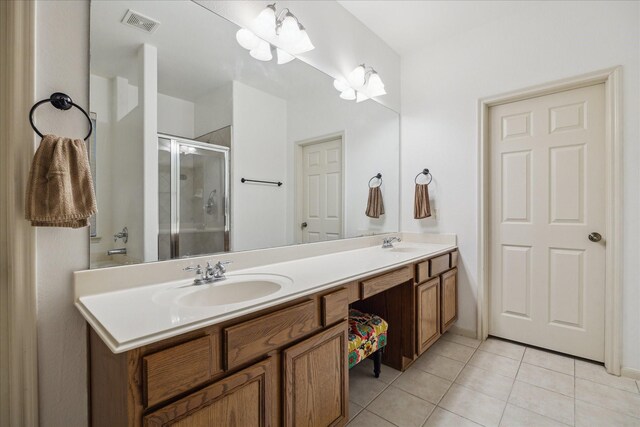 18411 S Raven Shore Dr, Cypress, TX 77433 - full bathroom featuring tile patterned floors, double vanity, and a stall shower