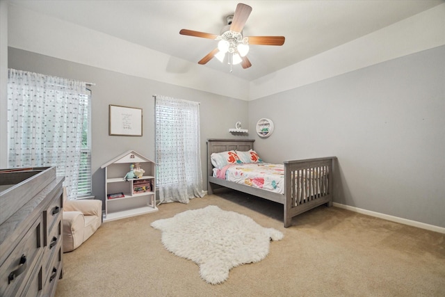 18411 S Raven Shore Dr, Cypress, TX 77433 - carpeted bedroom with baseboards and ceiling fan