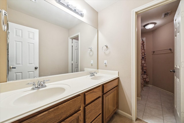 18411 S Raven Shore Dr, Cypress, TX 77433 - full bath with double vanity, tile patterned floors, and a shower with shower curtain